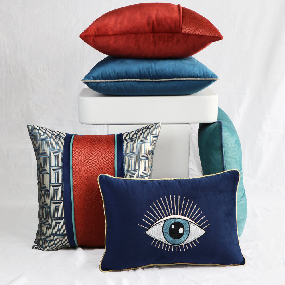 GEOMETRIC PATTERN BANDED PILLOW